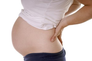 Schwangere mit Rueckenschmerzen in SSW 26